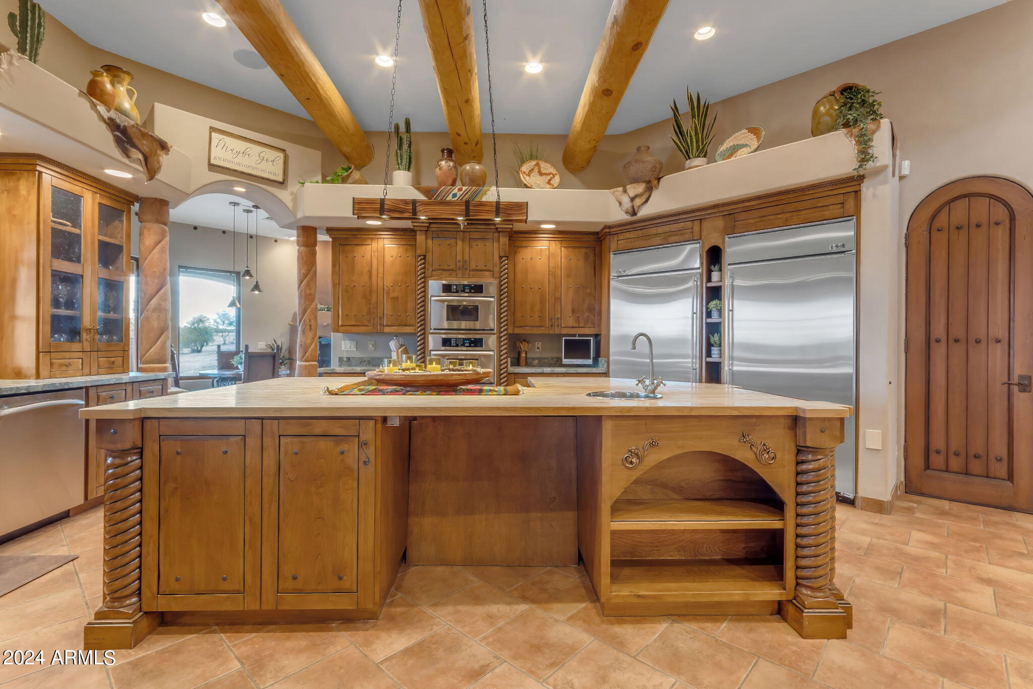 13330 East Jomax Road Scottsdale, AZ 85262 - Photo 108 of 164 a large living room with stainless steel appliances lots of wooden furniture