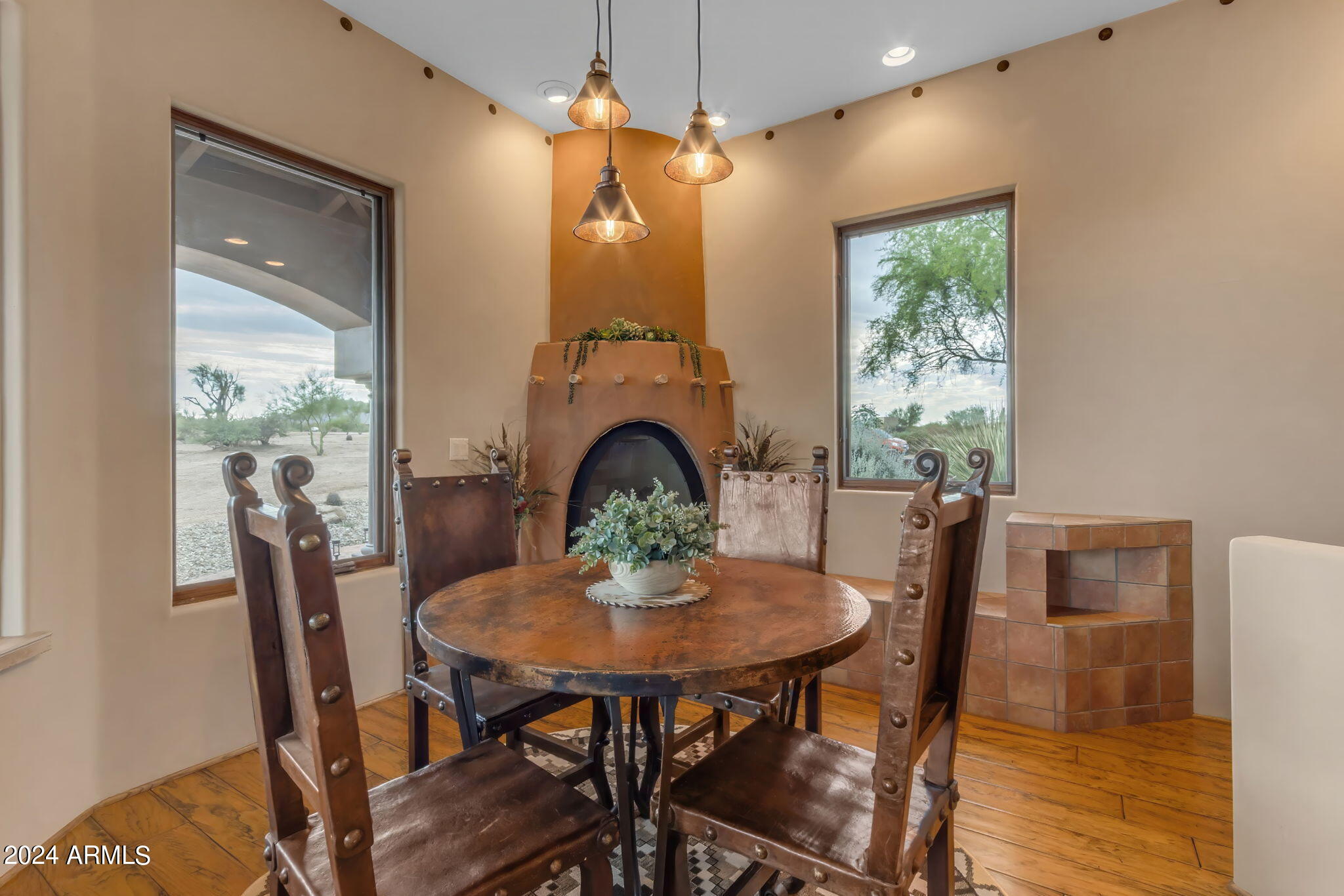 13330 East Jomax Road Scottsdale, AZ 85262 - Photo 114 of 164 a view of a dining room with furniture window and wooden floor