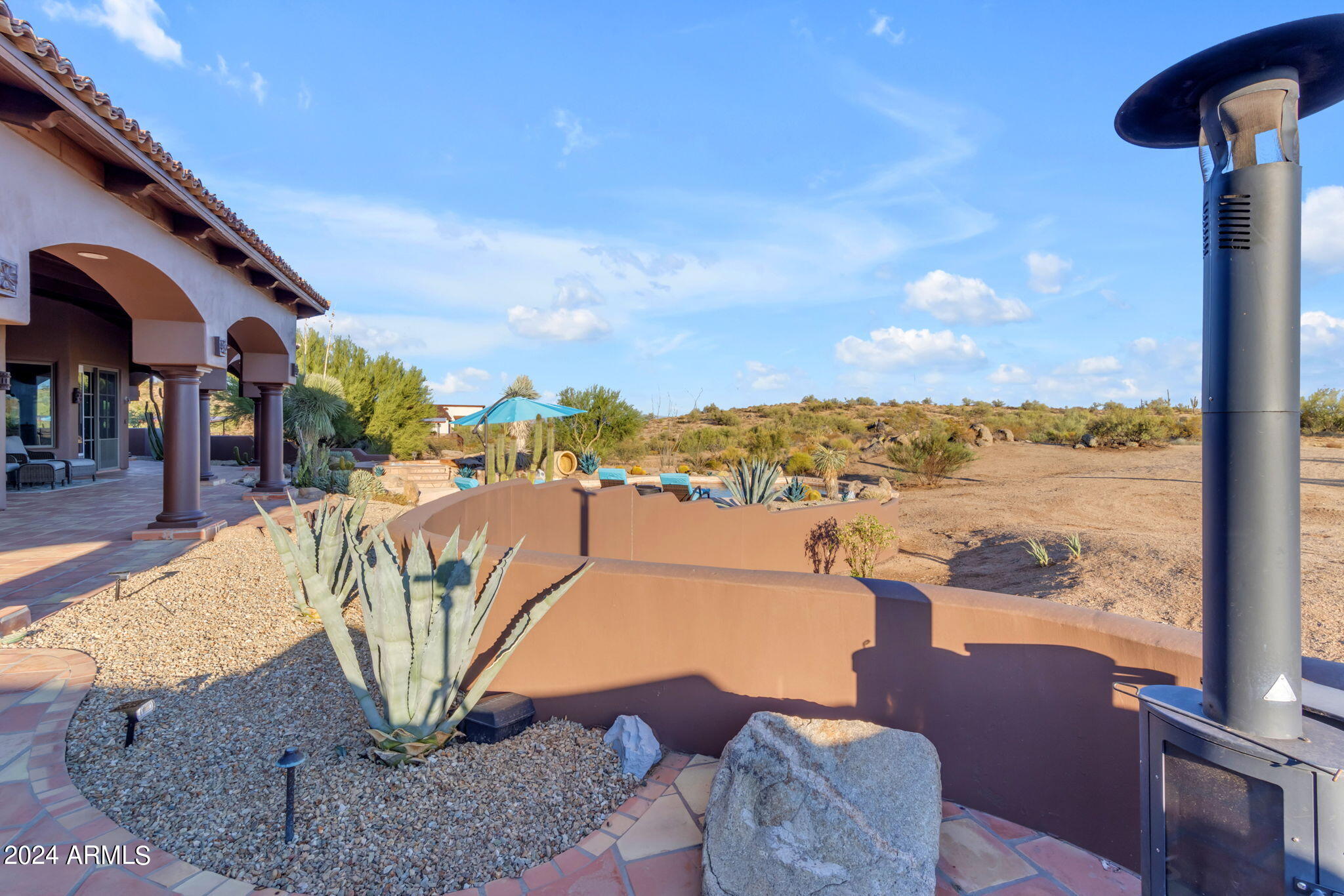 13330 East Jomax Road Scottsdale, AZ 85262 - Photo 44 of 164 a view of a terrace with furniture
