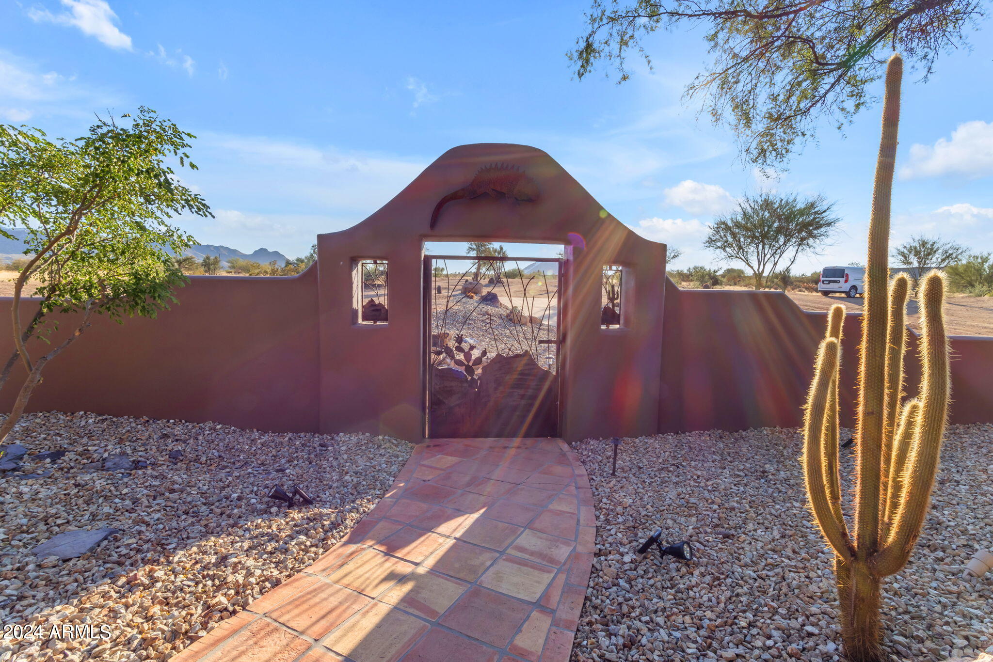13330 East Jomax Road Scottsdale, AZ 85262 - Photo 52 of 164 a front view of a house with garden
