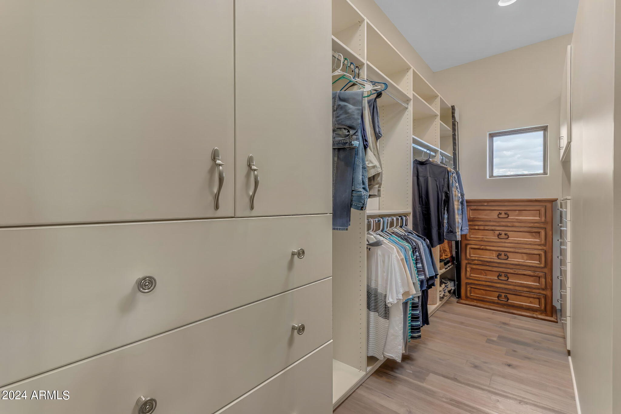 13330 East Jomax Road Scottsdale, AZ 85262 - Photo 81 of 164 a view of walk in closet with clothes
