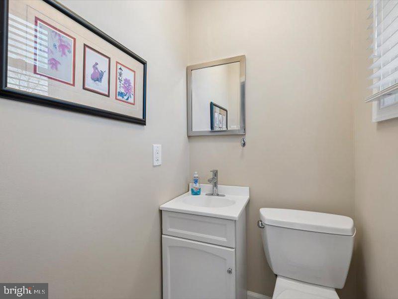 1723 Ridgeway Road Havertown, PA 19083 - Photo 22 of 35 a bathroom with a toilet a sink and mirror