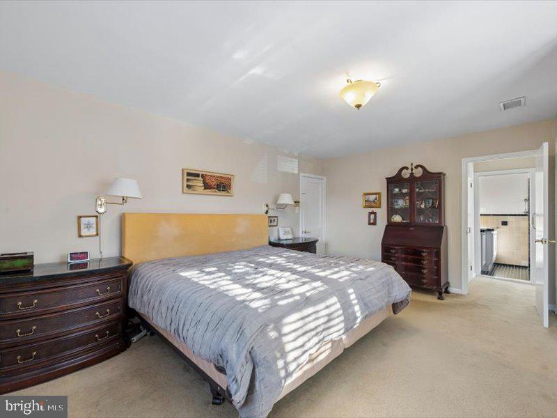 1723 Ridgeway Road Havertown, PA 19083 - Photo 26 of 35 a bedroom with a bed and wooden floor