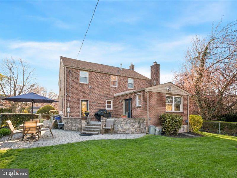 1723 Ridgeway Road Havertown, PA 19083 - Photo 35 of 35 a front view of house with a garden and patio