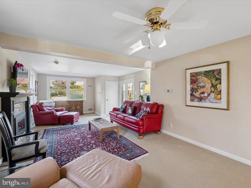 1723 Ridgeway Road Havertown, PA 19083 - Photo 10 of 35 a living room with furniture a chandelier and a window