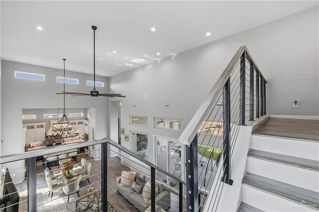 a bedroom with a bed and a flat tv screen on the table
