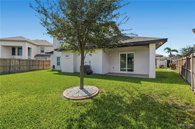 an aerial view of residential house with outdoor space