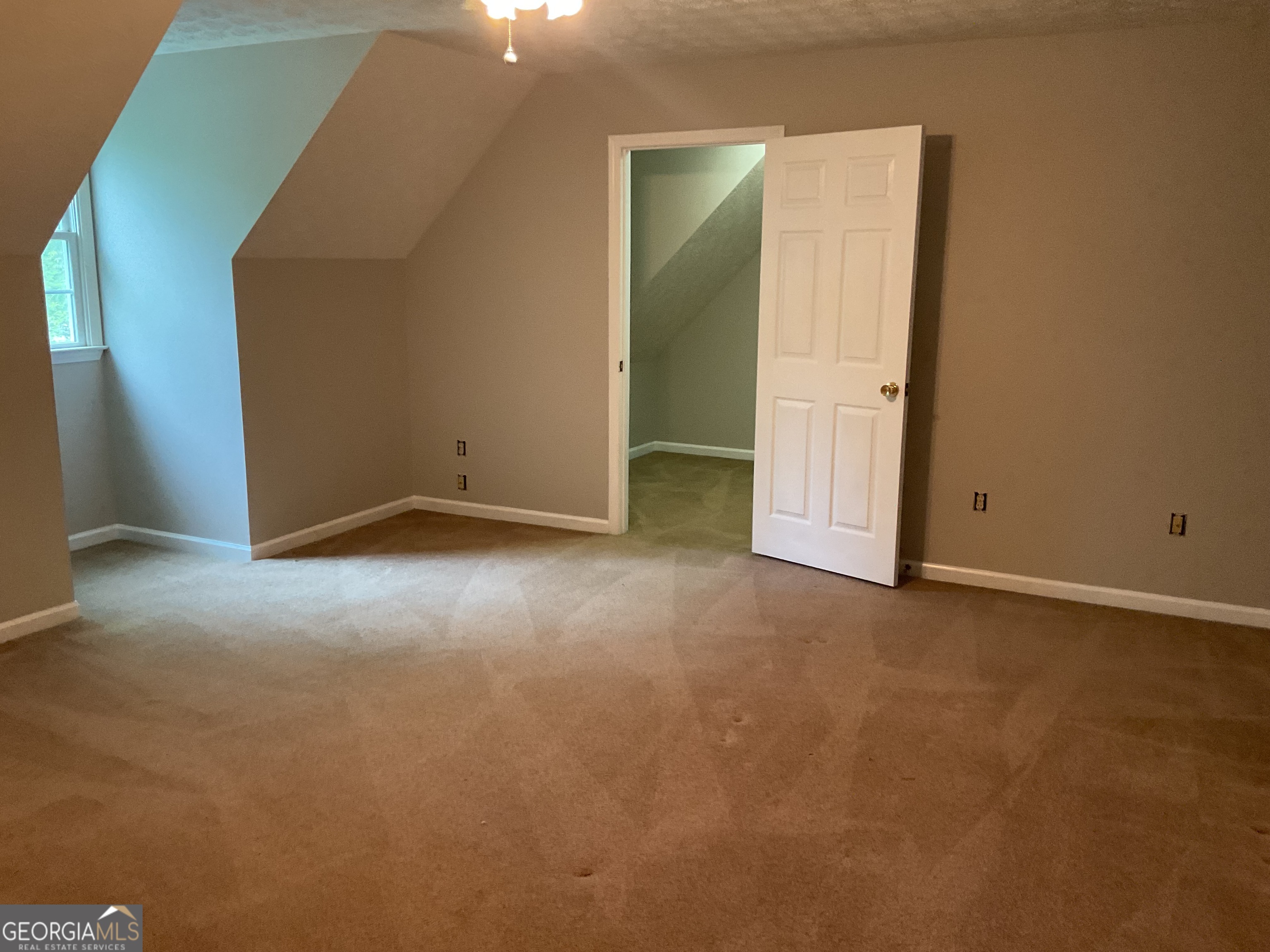 4800 Bethlehem Road Fairburn, GA 30213 - Photo 33 of 49 an empty room with closet area