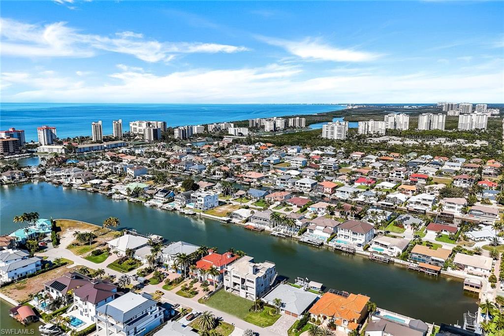 415 Seabee Avenue Naples, FL 34108 - Photo 25 of 32 an aerial view of a city