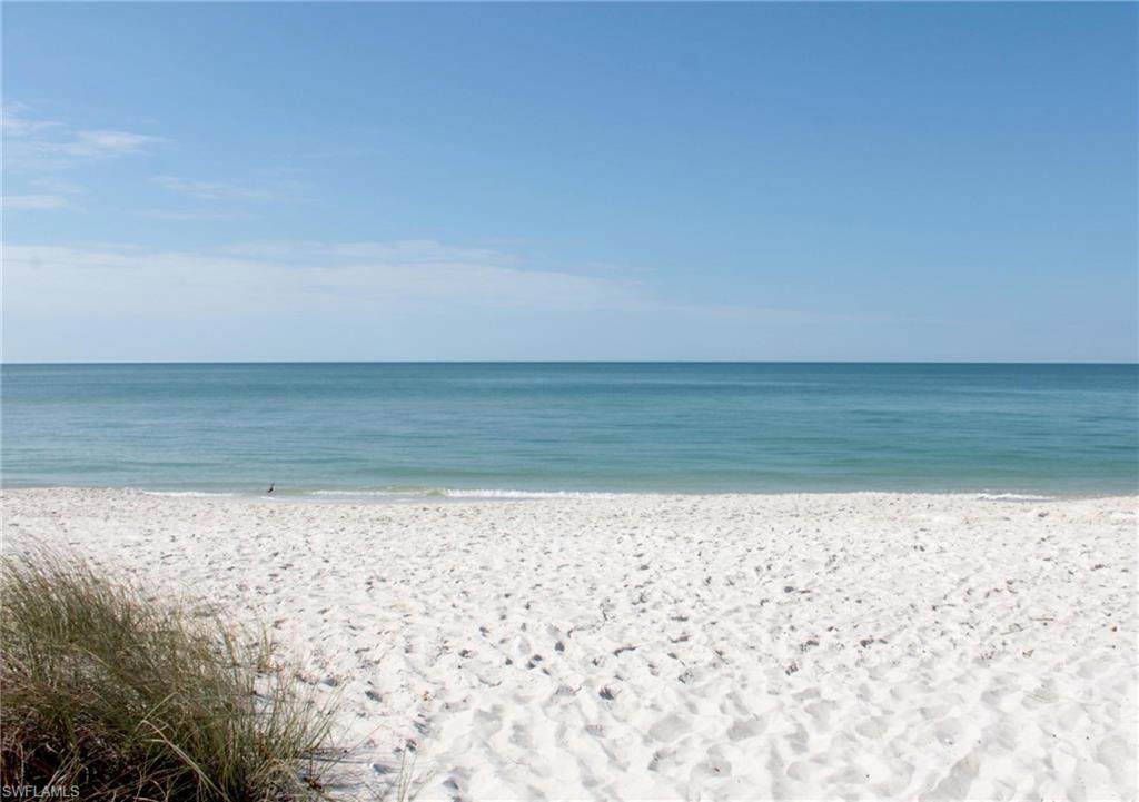 415 Seabee Avenue Naples, FL 34108 - Photo 27 of 32 a view of a beach with an ocean beach
