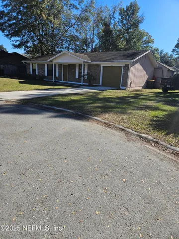 a view of a house with a swimming pool