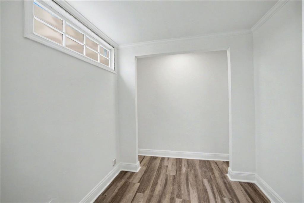 1605 Shackelford Road Griffin, GA 30224 - Photo 26 of 51 a view of a hallway with wooden floor