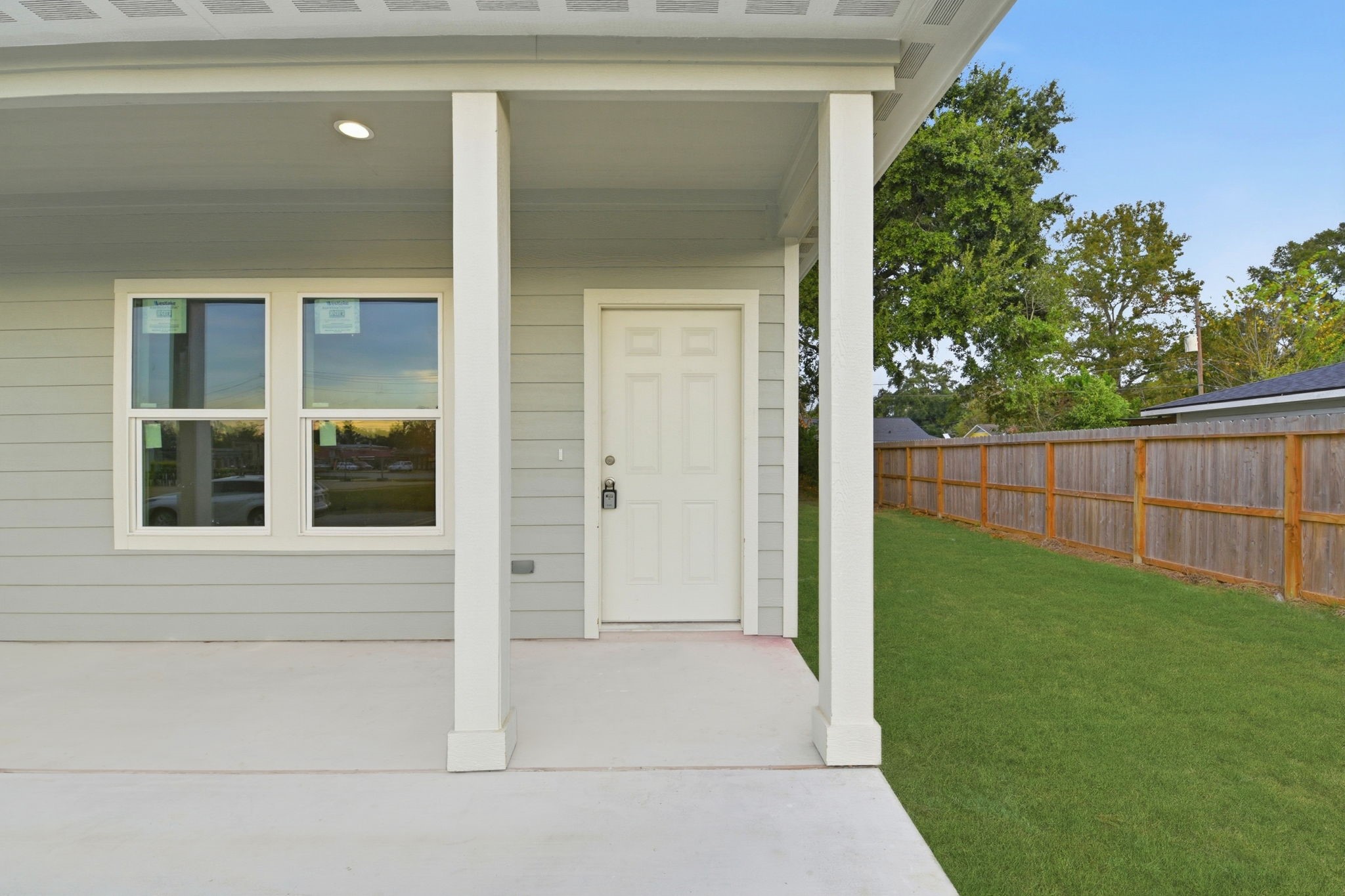 2521 Maple Street, Unit 2521B Liberty, TX 77575 - Photo 5 of 26 a view of backyard with door and porch