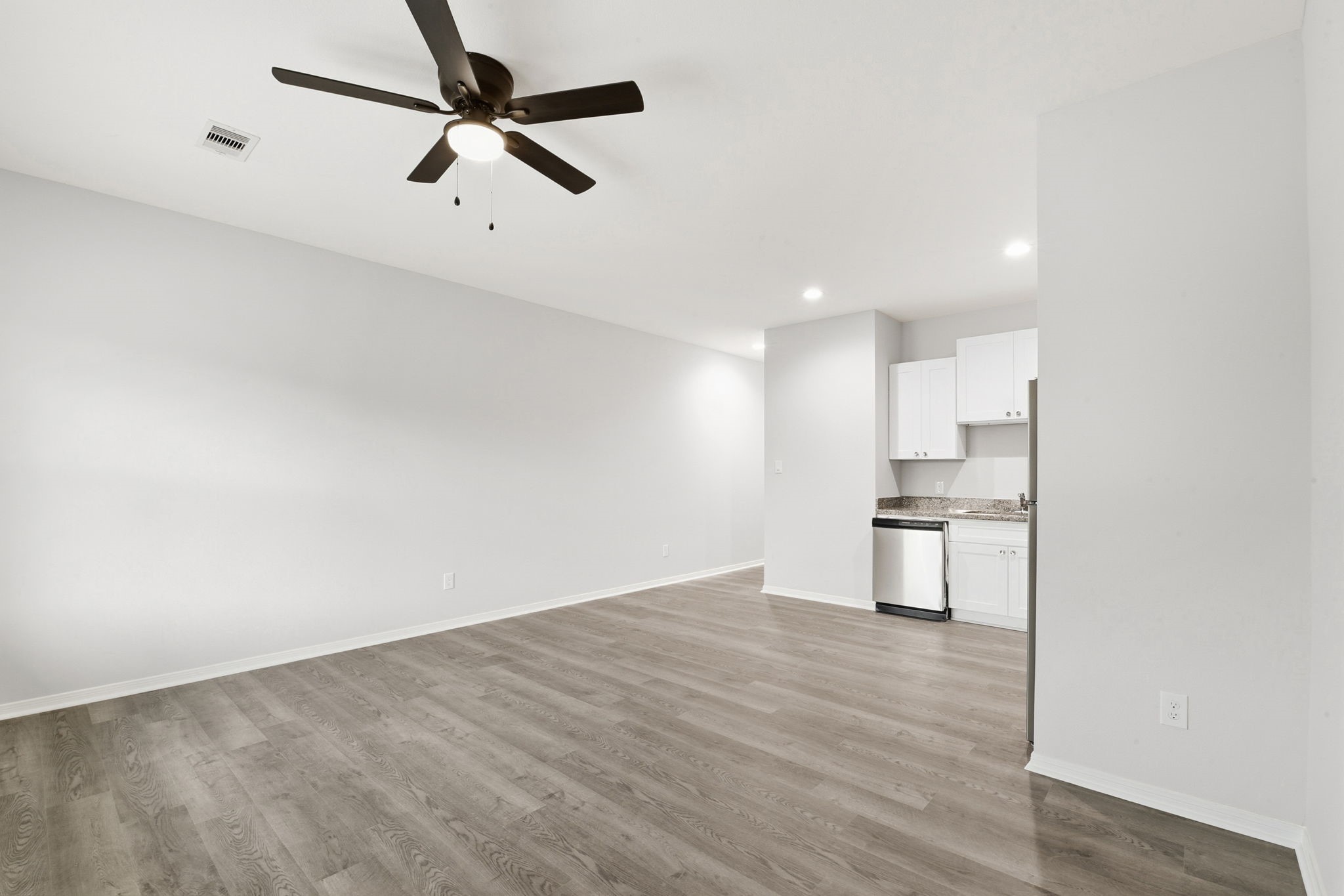2521 Maple Street, Unit 2521B Liberty, TX 77575 - Photo 7 of 26 a view of kitchen with wooden floor