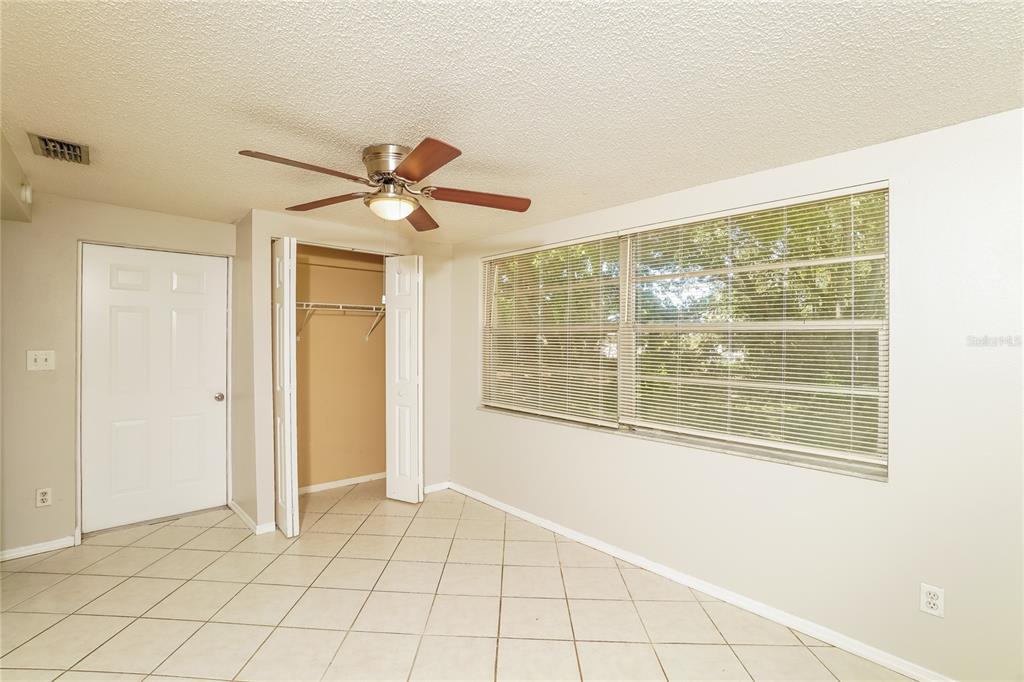 6503 Ridge Crest Drive Port Richey, FL 34668 - Photo 7 of 14 a view of an empty room with a window