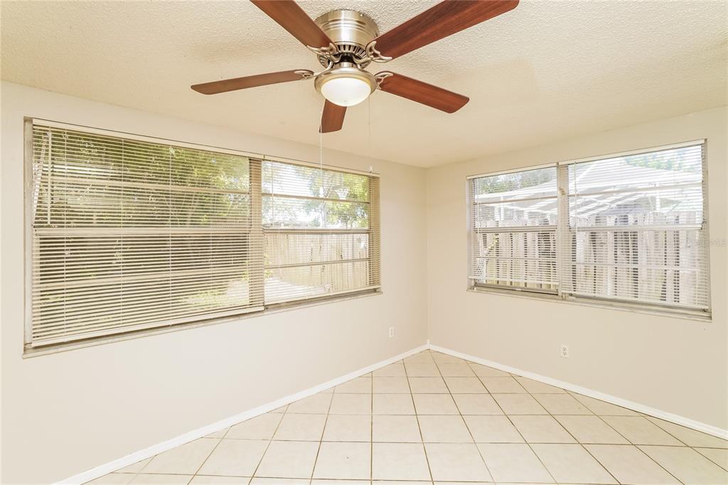 6503 Ridge Crest Drive Port Richey, FL 34668 - Photo 10 of 14 a view of an empty room with a window