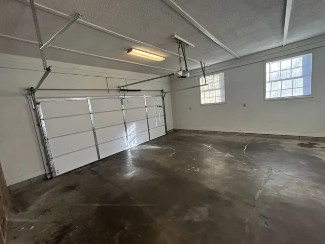 a view of a backyard with a garden