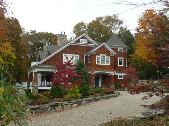 a front view of a house with yard