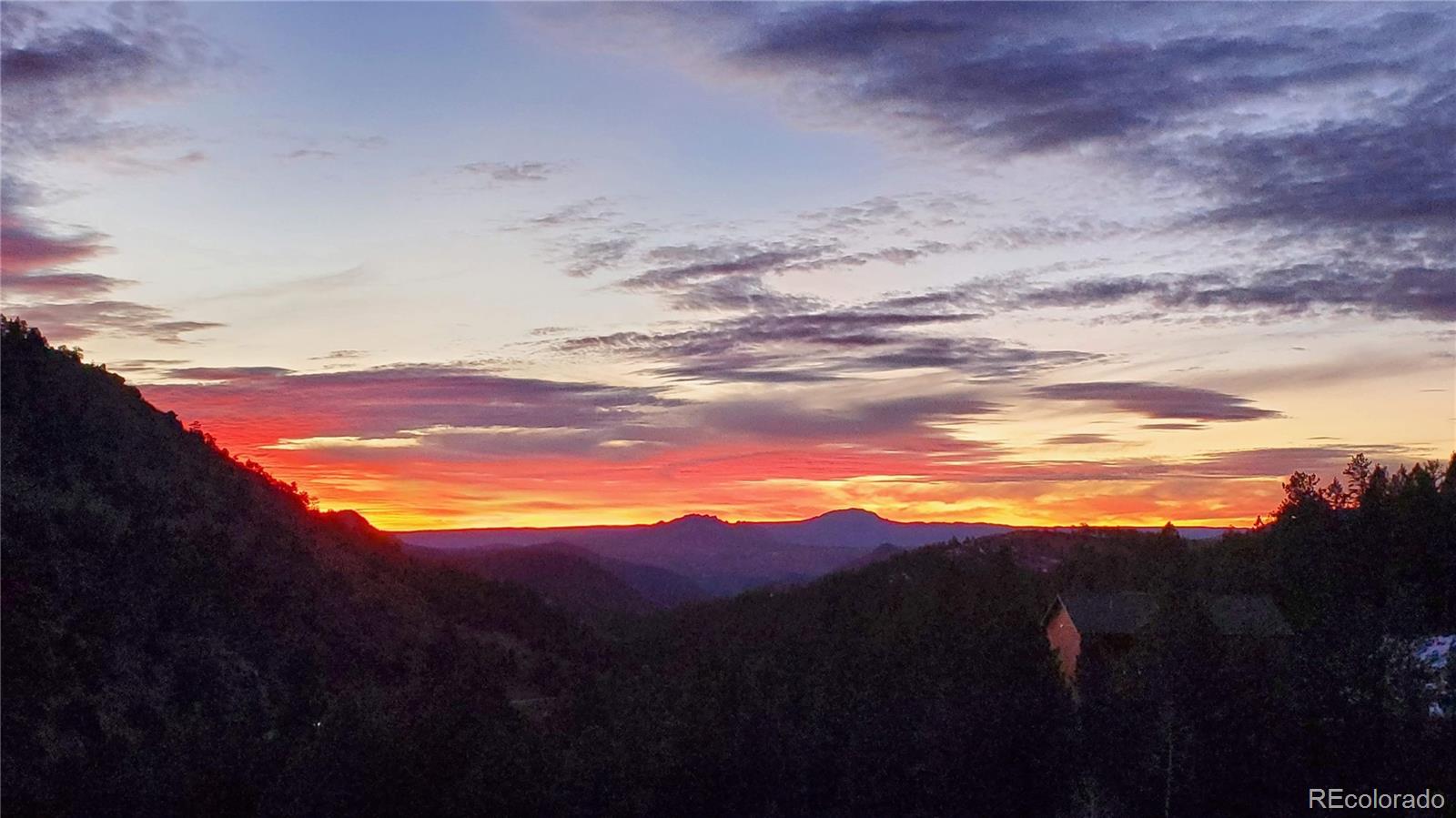 14514 Reserve Road Pine, CO 80470 - Photo 6 of 31 a view of an lake and mountain