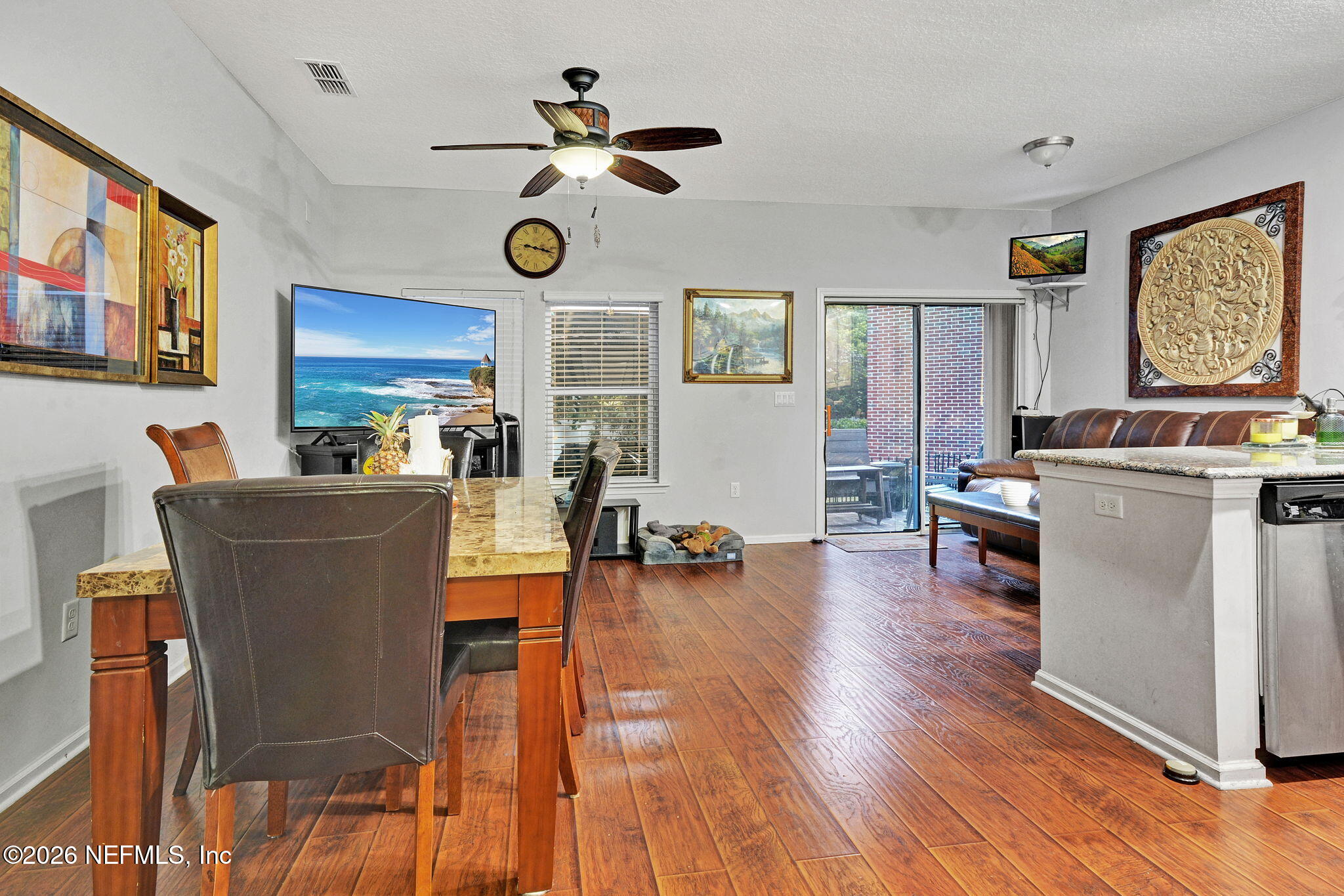 1537 Landau Road Jacksonville, FL 32225 - Photo 5 of 12 a view of a dining room with furniture window and wooden floor