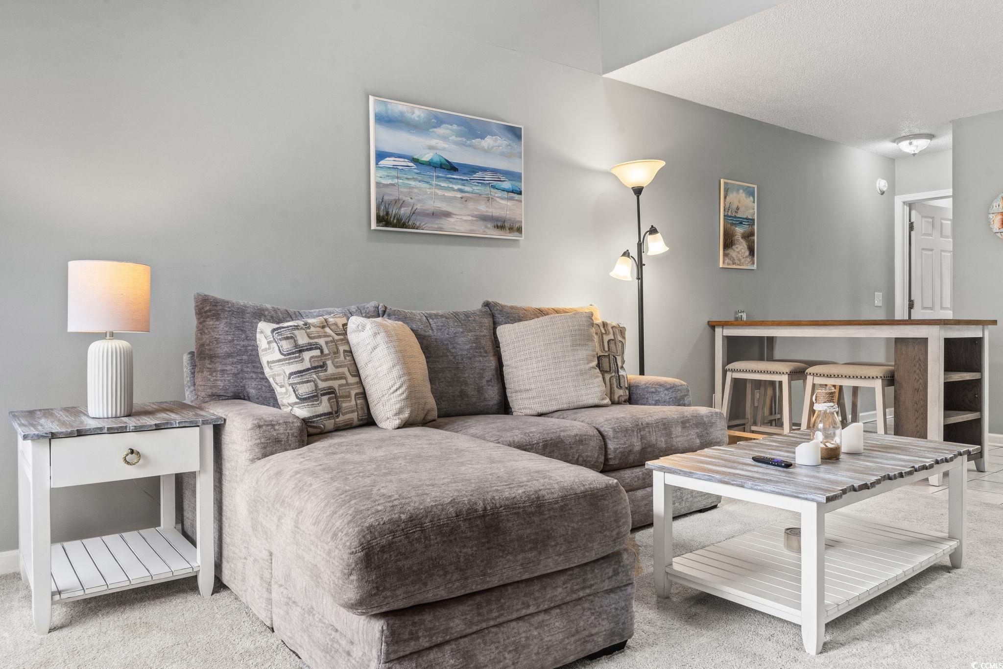 416 Cambridge Circle, Unit H5 Murrells Inlet, SC 29576 - Photo 20 of 28 Living room featuring lofted ceiling, light colore