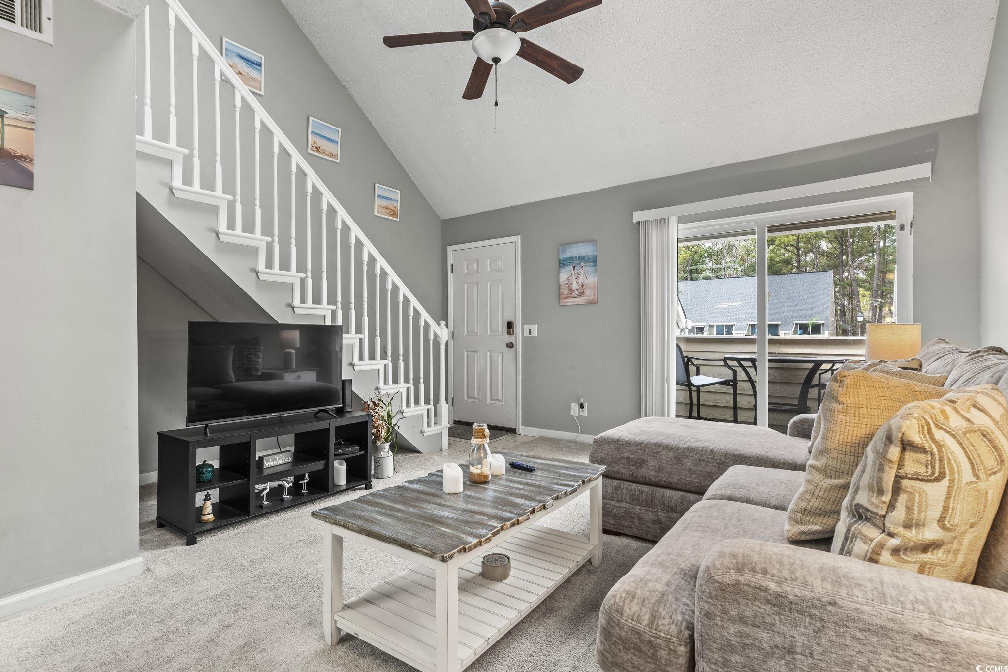 416 Cambridge Circle, Unit H5 Murrells Inlet, SC 29576 - Photo 2 of 28 Carpeted living room featuring ceiling fan and hig
