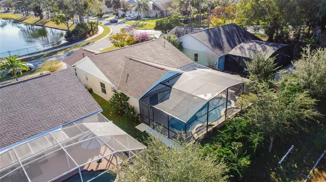 an aerial view of a house with outdoor space