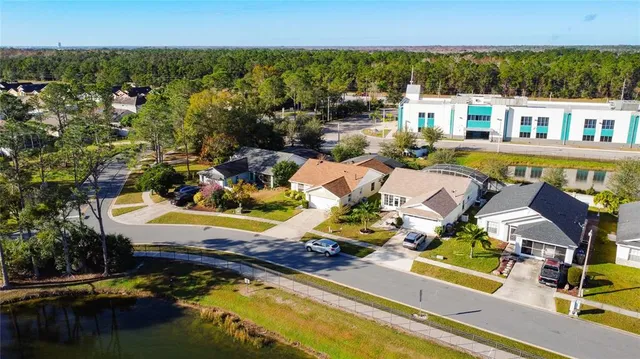 a view of a lake with a house