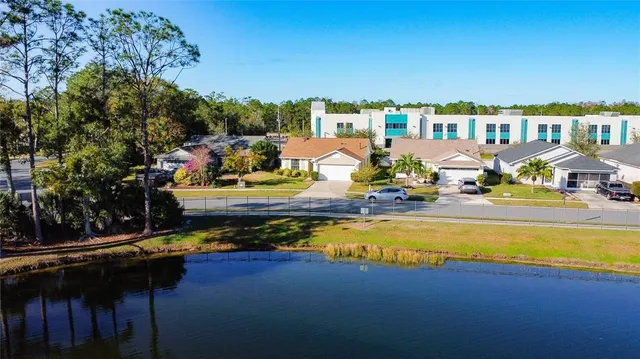 a view of swimming pool with outdoor seating
