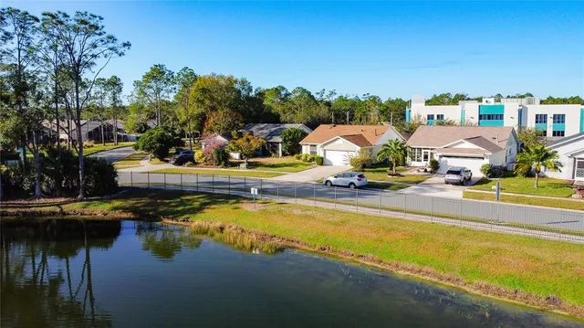 a view of a lake with houses