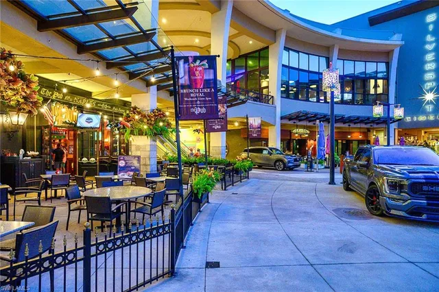 a view of a street with cars