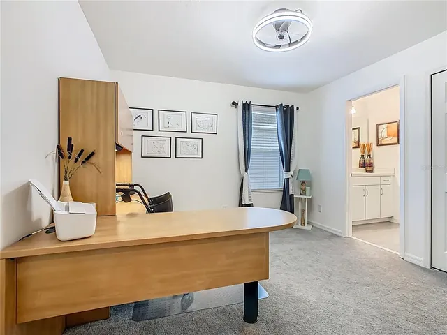 a bathroom with a shower a toilet and sink