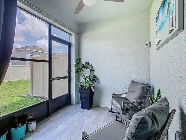 a view of a city with lawn chairs