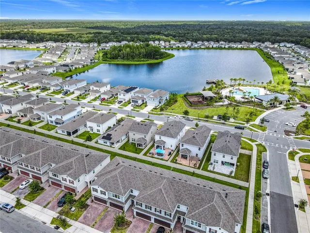 a kitchen with a sink stove and refrigerator