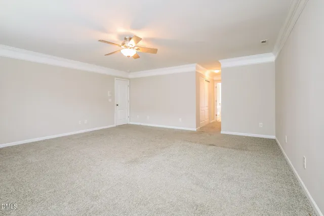 a kitchen with stainless steel appliances granite countertop wooden cabinets a refrigerator a stove a sink and a microwave