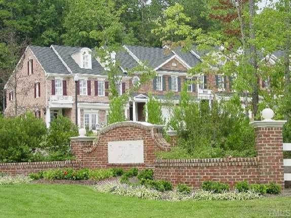 7254 Summit Waters Lane Raleigh, NC 27613 - Photo 1 of 1 a front view of a house with a yard