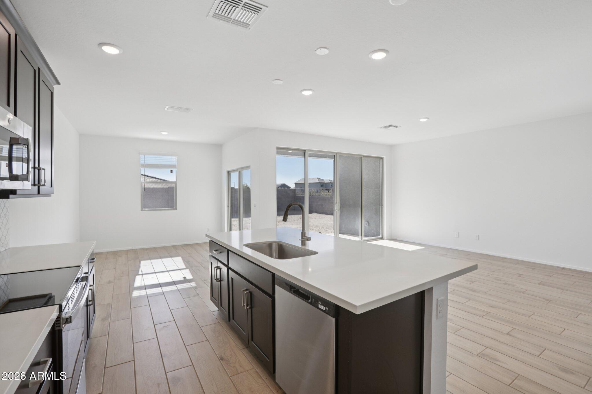 9540 West Gaby Road Tolleson, AZ 85353 - Photo 7 of 14 11-web-or-mls-W Bowker St-S1212-011