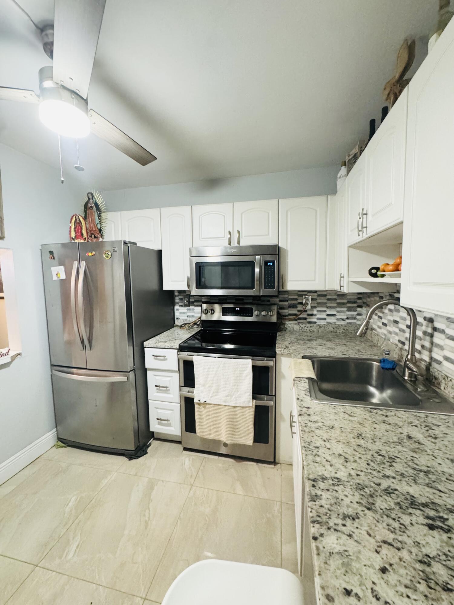 9370 Southwest 8th Street, Unit 117 Boca Raton, FL 33428 - Photo 3 of 27 IMG_3576