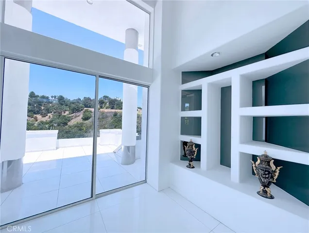 a view of a living room and window
