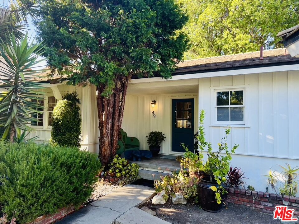 49 Ranchview Road Rolling Hills Estates, CA 90274 - Photo 1 of 49 a front view of a house with a yard