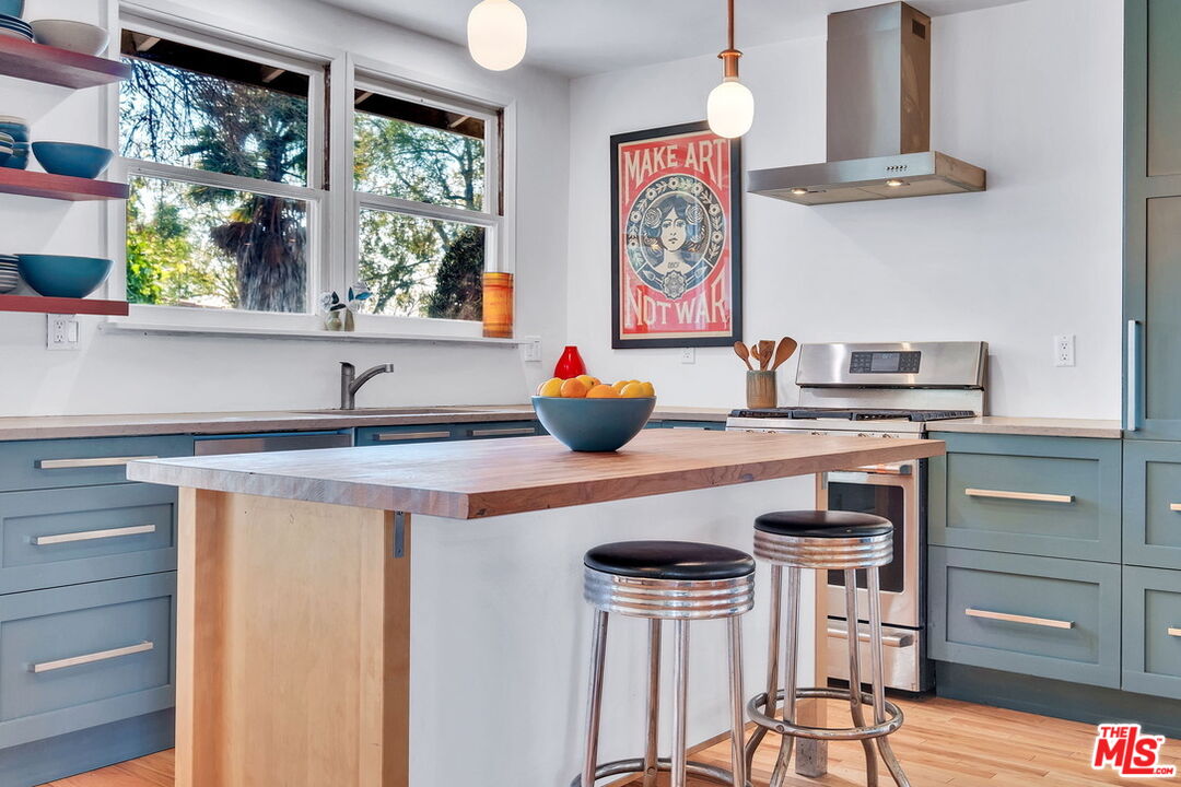 49 Ranchview Road Rolling Hills Estates, CA 90274 - Photo 13 of 49 a kitchen with a stove and cabinets