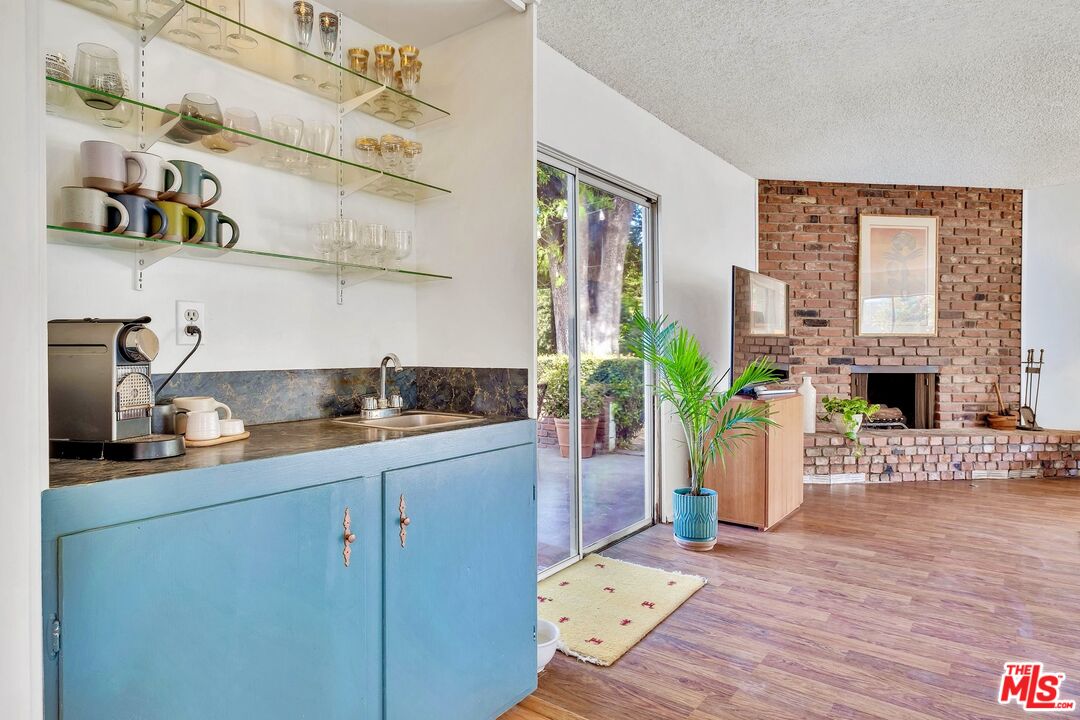 49 Ranchview Road Rolling Hills Estates, CA 90274 - Photo 19 of 49 a kitchen with stainless steel appliances granite countertop a refrigerator a sink dishwasher and wooden floor
