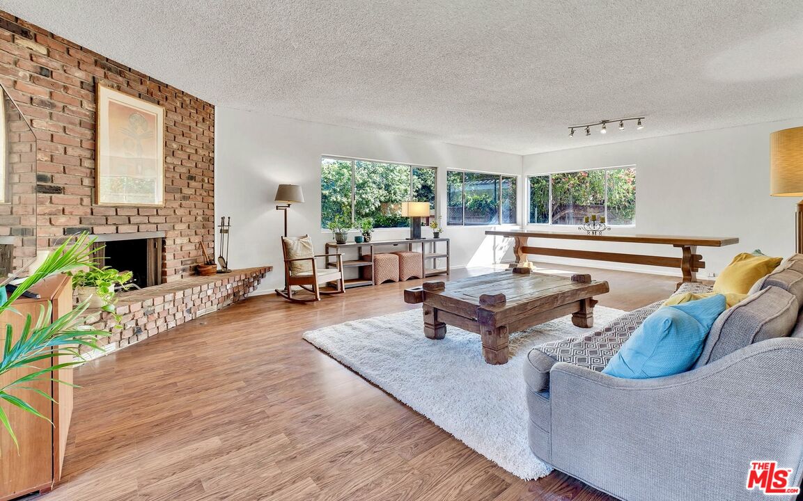 49 Ranchview Road Rolling Hills Estates, CA 90274 - Photo 20 of 49 a living room with fireplace furniture and a large window