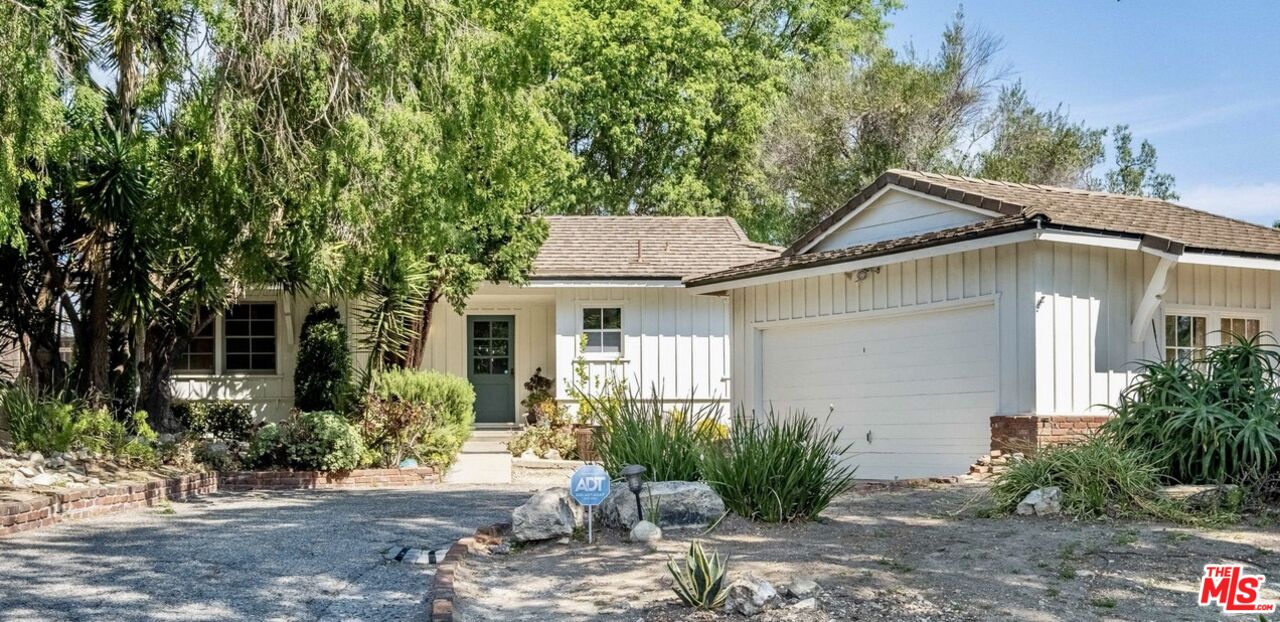 49 Ranchview Road Rolling Hills Estates, CA 90274 - Photo 2 of 49 a view of a house with a yard and plants