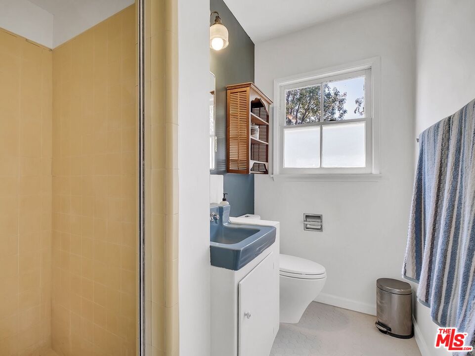 49 Ranchview Road Rolling Hills Estates, CA 90274 - Photo 25 of 49 a bathroom with a toilet sink and mirror