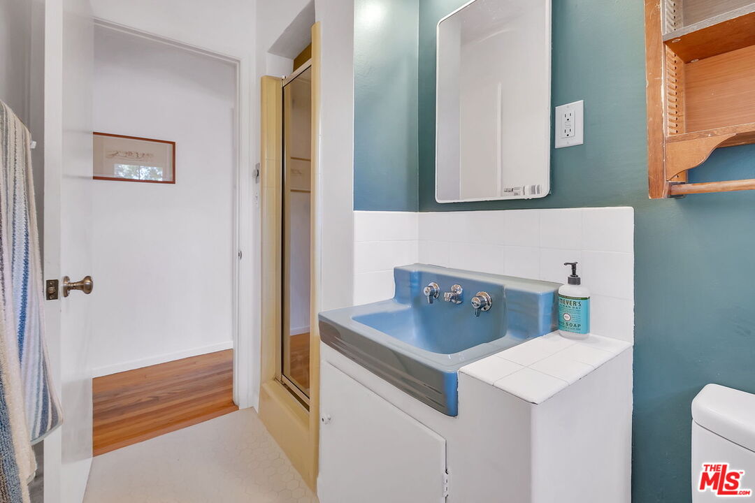 49 Ranchview Road Rolling Hills Estates, CA 90274 - Photo 26 of 49 a bathroom with a sink and a mirror