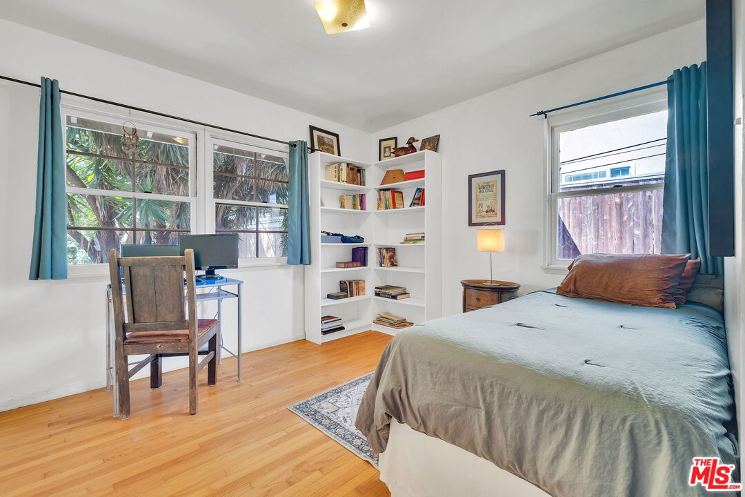 49 Ranchview Road Rolling Hills Estates, CA 90274 - Photo 27 of 49 a bedroom with a bed and a large window