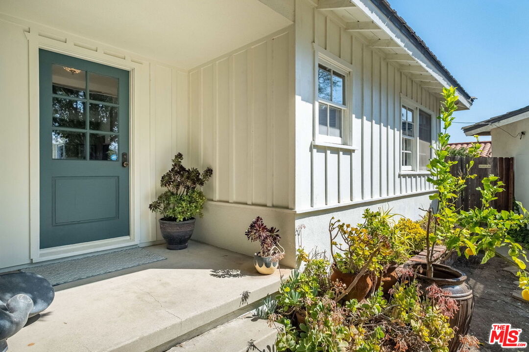 49 Ranchview Road Rolling Hills Estates, CA 90274 - Photo 3 of 49 a potted plant sitting in front of a house
