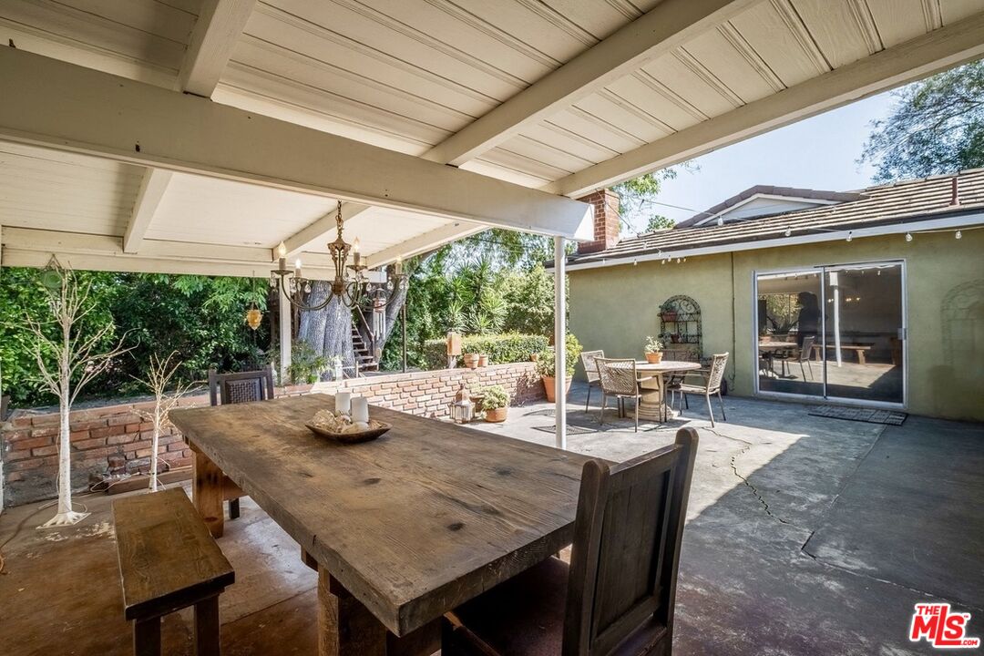 49 Ranchview Road Rolling Hills Estates, CA 90274 - Photo 37 of 49 a outdoor dining space with furniture and wooden floor