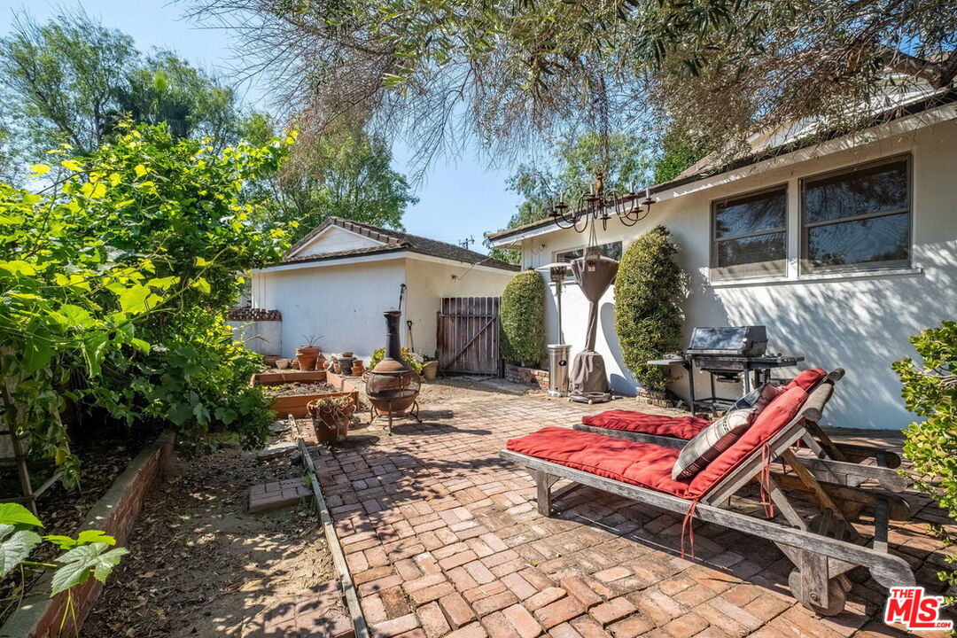 49 Ranchview Road Rolling Hills Estates, CA 90274 - Photo 43 of 49 a view of backyard with outdoor seating and trees